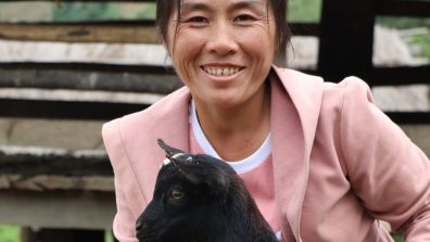 farmer with a goat